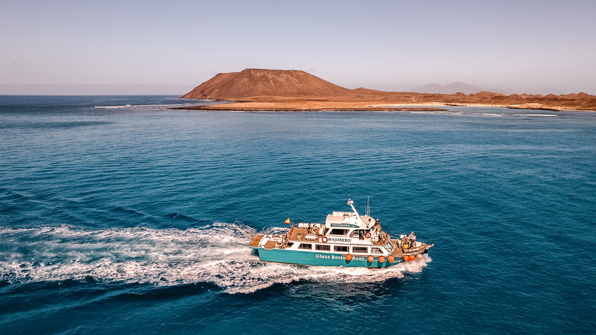 Barco Majorero by Naviera Nortour sailing beside Isla de Lobos