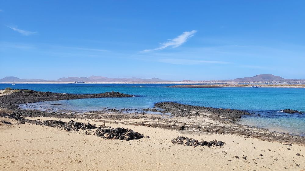Exposed beach on Isla de Lobos with no shops or natural shade